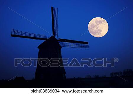 "Windmill and a full moon, province of North Holland, The Netherlands, Europe" View Large Photo Image Picture - "Windmill and a full moon, province of North Holland, The Netherlands, Europe". Fotosearch