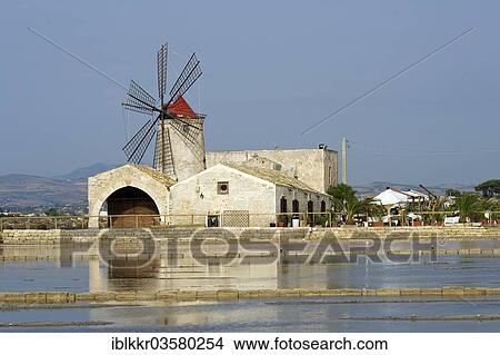 Picture - "Windmill in a saline, Trapani, Province of Trapani, Sicily, Italy, Europe". Fotosearch