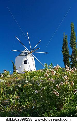Stock Photo - "Windmill in Castro Marim, Algarve, Portugal, Europe". Fotosearch