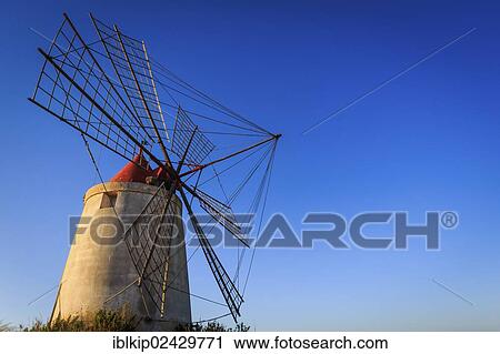 Stock Image - "Windmill, Laguna dello Stagnone near Trapani, Sicily, Italy, Europe". Fotosearch