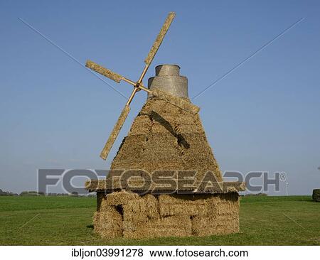 Stock Photo - "Windmill made of straw bales, Tomelilla, Scania, Sweden, Europe". Fotosearch