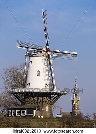 "Windmill of Veere, tower of the town hall at back, Veere, Walcheren, Zeeland province, The Netherlands, Europe" View Large Photo Image Stock Image - "Windmill of Veere, tower of the town hall at back, Veere, Walcheren, Zeeland province, The Netherlands, Europe". Fotosearch