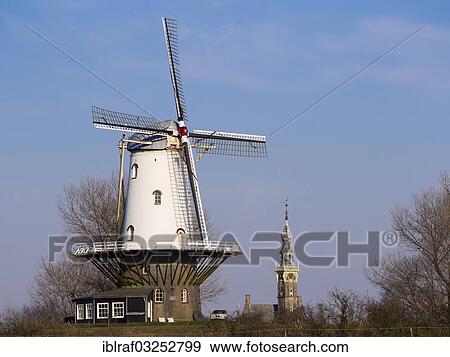 "Windmill of Veere, tower of the town hall at back, Veere, Walcheren, Zeeland province, The Netherlands, Europe" View Large Photo Image Stock Photo - "Windmill of Veere, tower of the town hall at back, Veere, Walcheren, Zeeland province, The Netherlands, Europe". Fotosearch