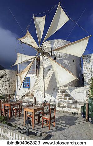 "Windmill, tables and chairs, village of Olympos, Karpathos, Dodecanese, South Aegean, Greece, Europe" View Large Photo Image Stock Image - "Windmill, tables and chairs, village of Olympos, Karpathos, Dodecanese, South Aegean, Greece, Europe". Fotosearch