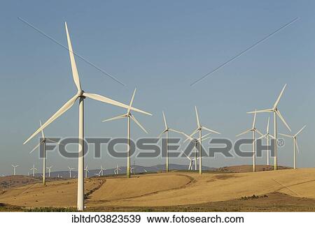 "Windmills on a wind farm near Zahara de los Atunes, Cadiz province, Andalucia, Spain, Europe" View Large Photo Image Stock Photo - "Windmills on a wind farm near Zahara de los Atunes, Cadiz province, Andalucia, Spain, Europe". Fotosearch