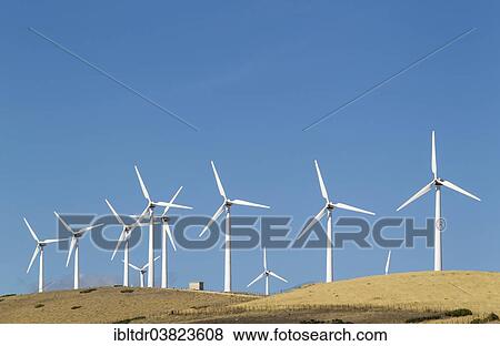 "Windmills on a wind farm near Zahara de los Atunes, Cadiz province, Andalucia, Spain, Europe" View Large Photo Image Stock Photo - "Windmills on a wind farm near Zahara de los Atunes, Cadiz province, Andalucia, Spain, Europe". Fotosearch