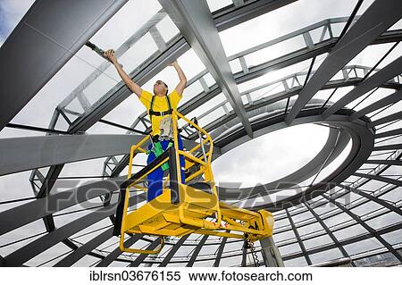 "Window cleaner cleaning the glass panels of the dome of the Reichstag building, seat of the German Bundestag, parliament, Berlin, Berlin, Germany, Europe" View Large Photo Image Stock Photography - "Window cleaner cleaning the glass panels of the dome of the Reichstag building, seat of the German Bundestag, parliament, Berlin, Berlin, Germany, Europe". Fotosearch