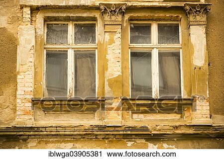 Stock Image - "Window of a closed down hotel in need of refurbishment, Gorlitzer Hof, GDR architecture, town centre of Gorlitz, Saxony, Germany, Europe". Fotosearch