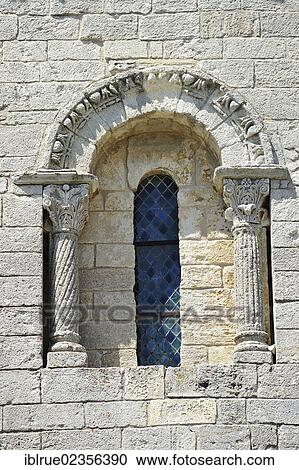 Stock Image - "Window of a Romanesque church, Revest du Bion, Provence, France, Europe". Fotosearch