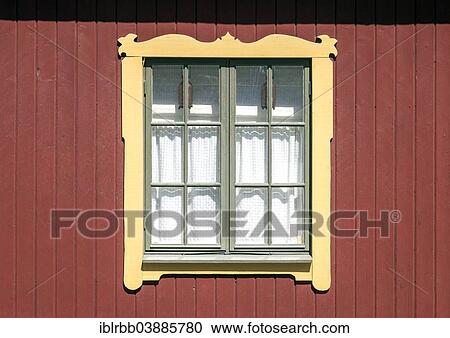 Stock Image - "Window on a wooden residential building, Vaxholm, Stockholm archipelago, Stockholm, Stockholm County, Sweden, Europe". Fotosearch