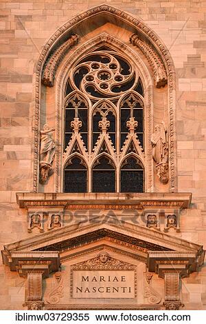 "Window over the main portal of the west facade of Milan Cathedral or Duomo di Santa Maria Nascente, in the evening light, Milan, Lombardy, Italy, Europe" View Large Photo Image Stock Photography - "Window over the main portal of the west facade of Milan Cathedral or Duomo di Santa Maria Nascente, in the evening light, Milan, Lombardy, Italy, Europe". Fotosearch
