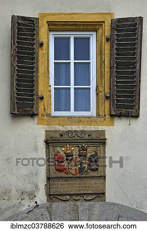 "Window with coat of arms on the Criminal Museum, on the right the arms of the Order of St John, left the arms of Rosenbach, Rothenburg ob der Tauber, Middle Franconia, Bavaria, Germany, Europe" View Large Photo Image Stock Photograph - "Window with coat of arms on the Criminal Museum, on the right the arms of the Order of St John, left the arms of Rosenbach, Rothenburg ob der Tauber, Middle Franconia, Bavaria, Germany, Europe". Fotosearch