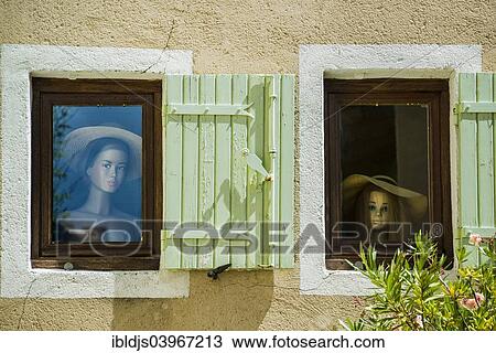 Stock Image - "Window with mannequins, Vaison-la-Romaine, Vaucluse, Provence-Alpes-Cote d'Azur, France, Europe". Fotosearch