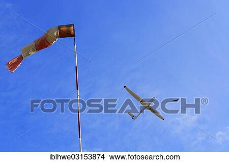 "Windsock and a glider during a winch launch against the wind, Hamburg, Hamburg, Hamburg, Germany, Europe" View Large Photo Image Picture - "Windsock and a glider during a winch launch against the wind, Hamburg, Hamburg, Hamburg, Germany, Europe". Fotosearch