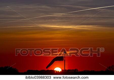 "Windsock in the sunset at Muritz Airpark, former military airport Rechlin-Larz, Larz, Mecklenburg-Western Pomerania, Germany, Europe" View Large Photo Image Stock Image - "Windsock in the sunset at Muritz Airpark, former military airport Rechlin-Larz, Larz, Mecklenburg-Western Pomerania, Germany, Europe". Fotosearch