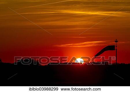 Stock Photo - "Windsock in the sunset at Muritz Airpark, former military airport Rechlin-Larz, Larz, Mecklenburg-Western Pomerania, Germany, Europe". Fotosearch