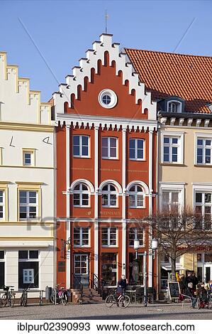Stock Image - "Wine bar on the north side of the market square of Greifswald, Mecklenburg-Western Pomerania, Germany, Europe". Fotosearch