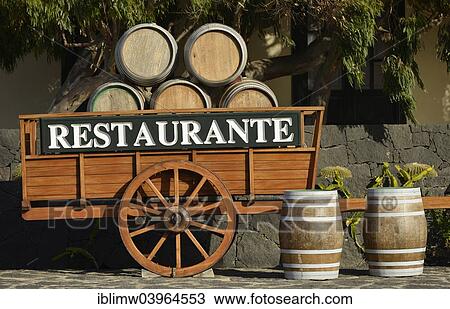 "Wine barrels in front of a bodega, restaurant, La Geria wine growing region, Lanzarote, Canary Islands, Spain, Europe" View Large Photo Image Stock Image - "Wine barrels in front of a bodega, restaurant, La Geria wine growing region, Lanzarote, Canary Islands, Spain, Europe". Fotosearch