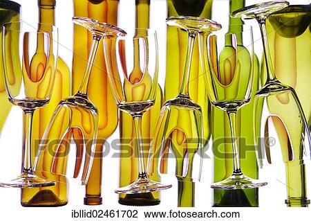 Wine glasses in front of wine bottles View Large Photo Image Stock Image - Wine glasses in front of wine bottles. Fotosearch