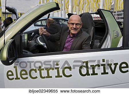 "Winfried Hermann, Baden-Wuerttemberg's Minister of Transport and Infrastructure driving an E-Smart car in Stuttgart, Baden-Wuerttemberg, Germany, Euro, Europe" View Large Photo Image Stock Photography - "Winfried Hermann, Baden-Wuerttemberg's Minister of Transport and Infrastructure driving an E-Smart car in Stuttgart, Baden-Wuerttemberg, Germany, Euro, Europe". Fotosearch