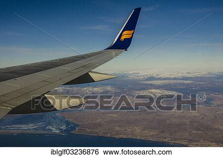 "Wing of an airplane over Southern Iceland, landing approach to Reykjavik, Sudisland, Iceland, Europe" View Large Photo Image Stock Photograph - "Wing of an airplane over Southern Iceland, landing approach to Reykjavik, Sudisland, Iceland, Europe". Fotosearch