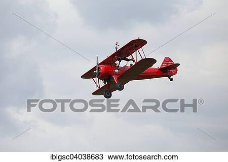 "Wing walker on a biplane at an air show, Bromont, Eastern Townships, Quebec Province, Canada, North America" View Large Photo Image Stock Image - "Wing walker on a biplane at an air show, Bromont, Eastern Townships, Quebec Province, Canada, North America". Fotosearch
