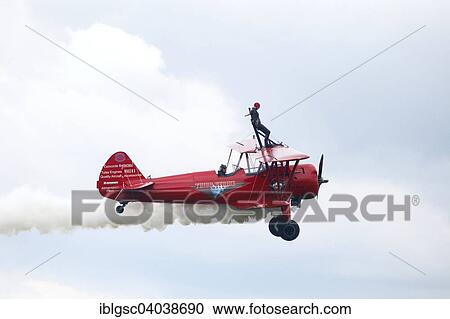 "Wing walker on a biplane at an air show, Bromont, Eastern Townships, Quebec Province, Canada, North America" View Large Photo Image Stock Image - "Wing walker on a biplane at an air show, Bromont, Eastern Townships, Quebec Province, Canada, North America". Fotosearch