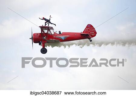 "Wing walker on a biplane at an air show, Bromont, Eastern Townships, Quebec Province, Canada, North America" View Large Photo Image Stock Photo - "Wing walker on a biplane at an air show, Bromont, Eastern Townships, Quebec Province, Canada, North America". Fotosearch