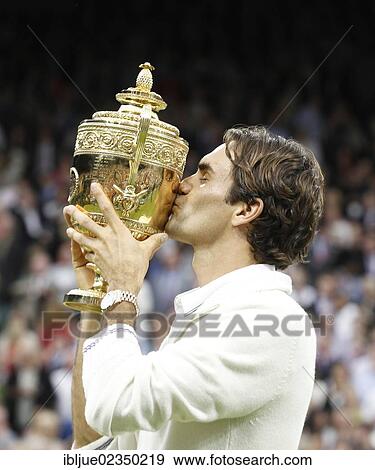 "Winners ceremony, Roger Federer, SUI, kissing the trophy, men's final, Wimbledon Championships 2012 AELTC, ITF Grand Slam Tennis Tournament, London, England, United Kingdom, Europe" View Large Photo Image Stock Photo - "Winners ceremony, Roger Federer, SUI, kissing the trophy, men's final, Wimbledon Championships 2012 AELTC, ITF Grand Slam Tennis Tournament, London, England, United Kingdom, Europe". Fotosearch