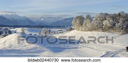 "Winter landscape, view from the Aidlinger Hoehe on the Estergebirge mountains, Wetterstein range and Ettaler Mandl peak above the Loisachtal valley and the Murnauer Moos, Upper Bavaria, Germany, Europe" View Large Photo Image Stock Image - "Winter landscape, view from the Aidlinger Hoehe on the Estergebirge mountains, Wetterstein range and Ettaler Mandl peak above the Loisachtal valley and the Murnauer Moos, Upper Bavaria, Germany, Europe". Fotosearch