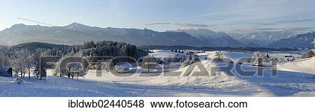 "Winter landscape, view from the Aidlinger Hoehe on Mt. Herzogstand, Mt. Heimgarten, Estergebirge mountains, Wetterstein range and Ettaler Mandl peak above the Loisachtal valley and the Murnauer Moos, Upper Bavaria, Germany, Europe" View Large Photo Image Stock Photo - "Winter landscape, view from the Aidlinger Hoehe on Mt. Herzogstand, Mt. Heimgarten, Estergebirge mountains, Wetterstein range and Ettaler Mandl peak above the Loisachtal valley and the Murnauer Moos, Upper Bavaria, Germany, Europe". Fotosearch