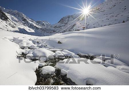 Stock Image - "Winter landscape with Pitze brook, Pitztal, North Tyrol, Austria, Europe". Fotosearch