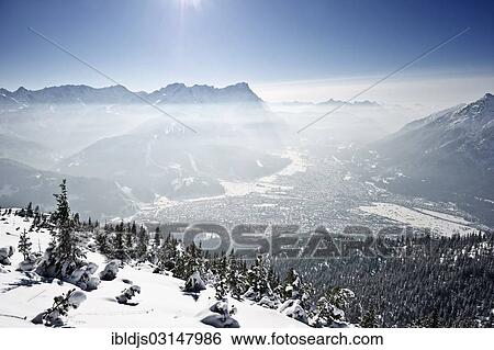 "Winter landscape with snow-covered fir trees and the sun, Wank, Ester Mountains, Upper Bavaria, Bavaria, Germany, Europe" View Large Photo Image Stock Photograph - "Winter landscape with snow-covered fir trees and the sun, Wank, Ester Mountains, Upper Bavaria, Bavaria, Germany, Europe". Fotosearch