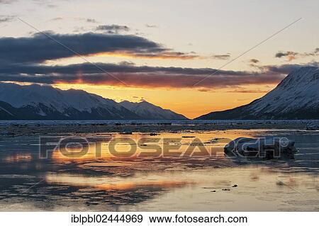 Stock Photo - "Winter sunset over Turnagain Arm, Alaska". Fotosearch