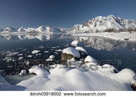 Stock Image - "Wintry fjord with mountains, Vagan, Lofoten, Norway, Europe". Fotosearch