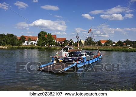 "Wipfeld ferry with passengers on the Main river, behind the Fahr village, Wipfeld, Lower Franconia, Bavaria, Germany, Europe" View Large Photo Image Stock Photo - "Wipfeld ferry with passengers on the Main river, behind the Fahr village, Wipfeld, Lower Franconia, Bavaria, Germany, Europe". Fotosearch