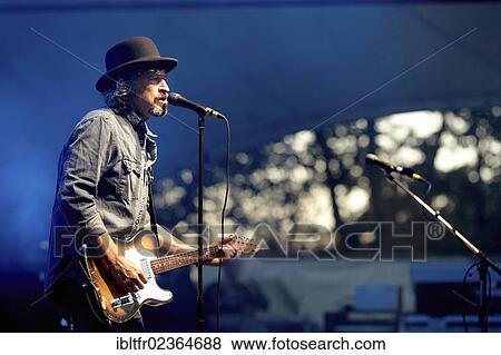 "Wolfgang Niedecken, frontman of the rock group BAP, performing during the final concert of the BAP tour, Loreley open air stage, St. Goarshausen, Rhineland-Palatinate, Germany, Europe" View Large Photo Image Stock Photo - "Wolfgang Niedecken, frontman of the rock group BAP, performing during the final concert of the BAP tour, Loreley open air stage, St. Goarshausen, Rhineland-Palatinate, Germany, Europe". Fotosearch