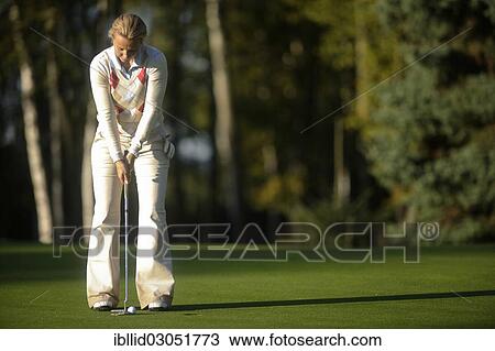 "Woman, 41, playing golf on a golf course, golf resort, Karlovy Vary, Karlovy Vary Region, Bohemia, Czech Republic, Europe" View Large Photo Image Stock Image - "Woman, 41, playing golf on a golf course, golf resort, Karlovy Vary, Karlovy Vary Region, Bohemia, Czech Republic, Europe". Fotosearch