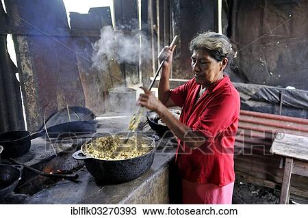 "Woman, 58, preparing tortillas in a simple wood stove in a kitchen, La Sabaneta, Departamento Masaya, Nicaragua, North America" View Large Photo Image Stock Image - "Woman, 58, preparing tortillas in a simple wood stove in a kitchen, La Sabaneta, Departamento Masaya, Nicaragua, North America". Fotosearch