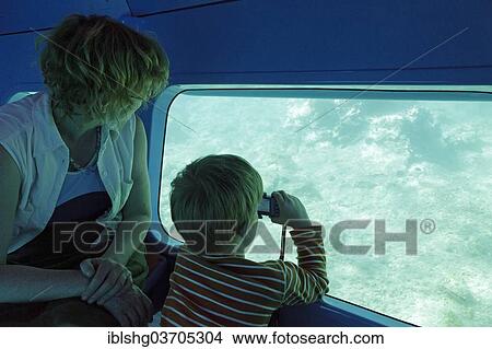"Woman and boy travelling in a semi submersible boat, Rab, Rab, Primorje-Gorski Kotar, Croatia, Europe" View Large Photo Image Picture - "Woman and boy travelling in a semi submersible boat, Rab, Rab, Primorje-Gorski Kotar, Croatia, Europe". Fotosearch