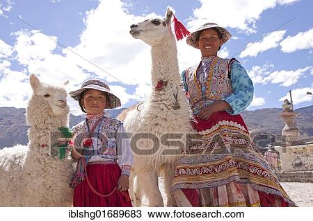 "Woman and girl with llama and alpaca in Maca near Colca Canyon, Peru, South America" View Large Photo Image Stock Image - "Woman and girl with llama and alpaca in Maca near Colca Canyon, Peru, South America". Fotosearch