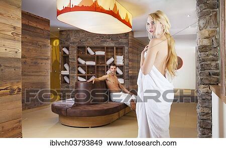 Woman and man relaxing in the relaxation area of a spa complex View Large Photo Image Stock Photo - Woman and man relaxing in the relaxation area of a spa complex. Fotosearch