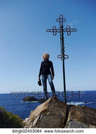 "Woman at a summit cross, Roque de las Bodegas, Tenerife, Canary Islands, Spain, Europe" View Large Photo Image Picture - "Woman at a summit cross, Roque de las Bodegas, Tenerife, Canary Islands, Spain, Europe". Fotosearch