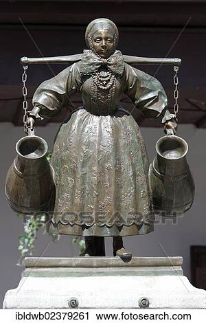 "Woman carrying water jugs, Bamberka, Old Town Square, Stary Rynek, Poznan, Poland, Europe" View Large Photo Image Stock Image - "Woman carrying water jugs, Bamberka, Old Town Square, Stary Rynek, Poznan, Poland, Europe". Fotosearch