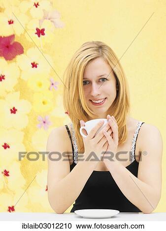 Stock Image - Woman drinking coffee. Fotosearch