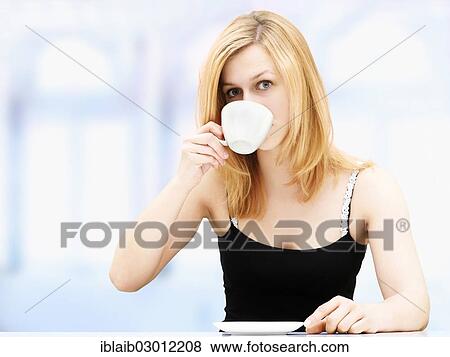 Stock Photo - Woman drinking coffee. Fotosearch