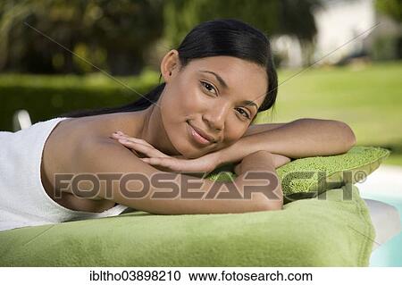 "Woman enjoying a wellness and spa treatment, South Africa, Africa" View Large Photo Image Stock Image - "Woman enjoying a wellness and spa treatment, South Africa, Africa". Fotosearch