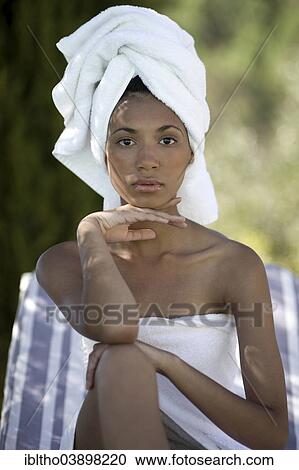 Stock Image - "Woman enjoying a wellness and spa treatment, South Africa, Africa". Fotosearch
