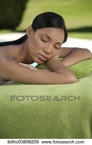 "Woman enjoying a wellness and spa treatment, South Africa, Africa" View Large Photo Image Stock Photo - "Woman enjoying a wellness and spa treatment, South Africa, Africa". Fotosearch