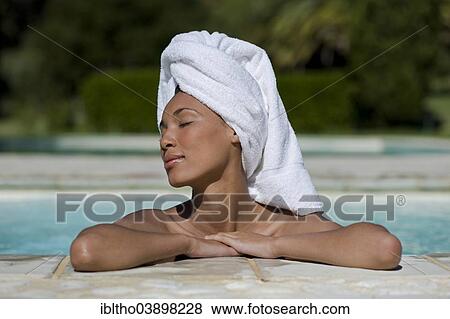 "Woman enjoying a wellness and spa treatment, South Africa, Africa" View Large Photo Image Stock Photo - "Woman enjoying a wellness and spa treatment, South Africa, Africa". Fotosearch